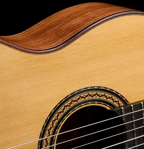 The soundboard and side of a 2025 Andy Culpepper classical guitar made of cedar and Honduran rosewood