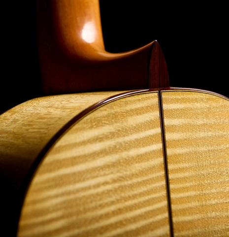 The heel, back binding and purfling of a 2026 Andy Culpepper "Santos" classical guitar made of spruce and maple