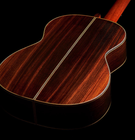 The back and sides of a 1998 David Daily classical guitar made of cedar and Indian rosewood