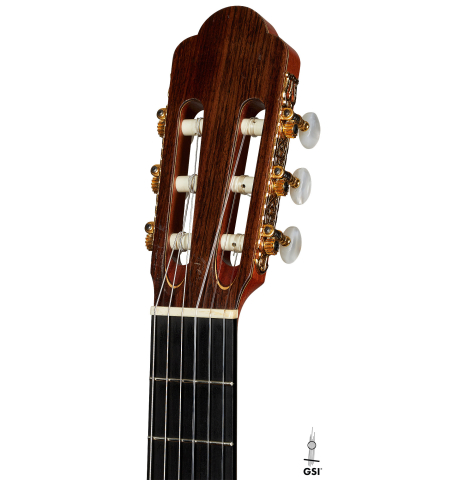 The headstock of a 1998 David Daily classical guitar made of cedar and Indian rosewood