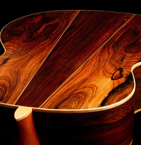 The heel, back binding and purflings of a 1987 David Daily classical guitar made of spruce and CSA rosewood