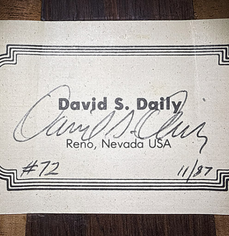 The label of a 1987 David Daily classical guitar made of spruce and CSA rosewood