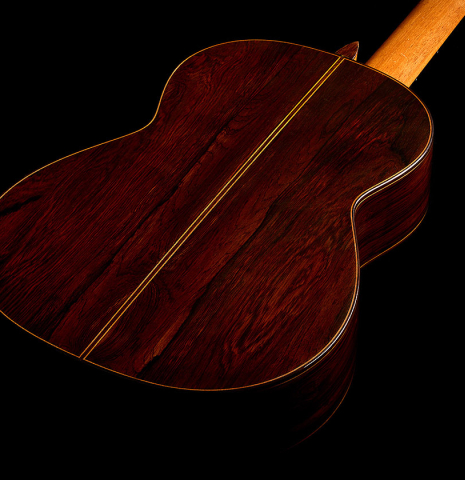 The back and sides of a 1999 Matthias Dammann double-top classical guitar made of cedar and CSA rosewood