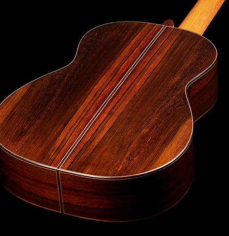 The back and sides of a 2025 Thomas Dauge classical guitar made of spruce and African rosewood