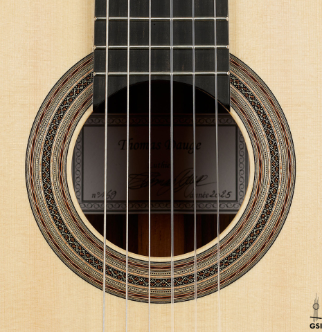 The rosette of a 2025 Thomas Dauge classical guitar made of spruce and African rosewood