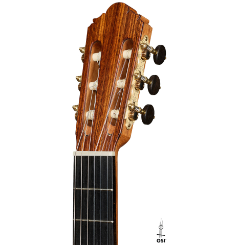 The headstock of a 2026 Thomas Dauge classical guitar made of spruce and African rosewood