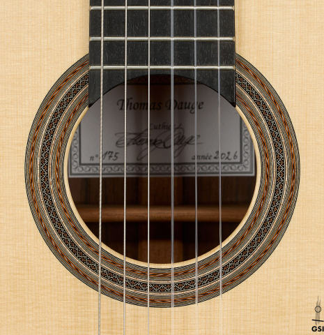 The rosette of a 2026 Thomas Dauge classical guitar made of spruce and African rosewood