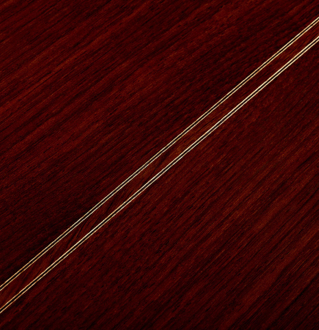 The back center seam of a 2019 Thomas Dauge "d'après Daniel Friederich" classical guitar made of cedar and Indian rosewood