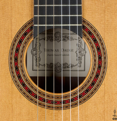 The rosette of a 2019 Thomas Dauge "d'après Daniel Friederich" classical guitar made of cedar and Indian rosewood