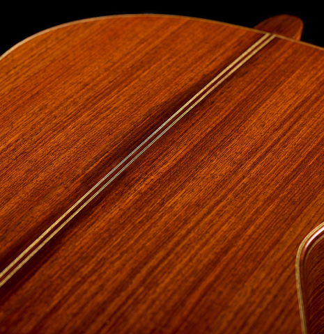 The back center seam of a 1993 Christopher Dean classical guitar made of spruce and Indian rosewood