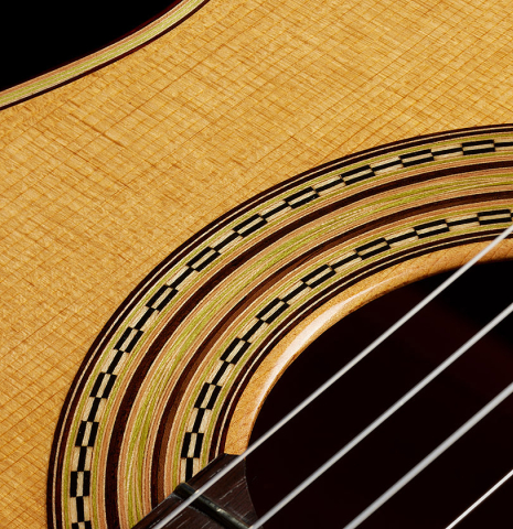 The top and rosette detail of a 2025 Francesco De Gregorio "Torres, SE 111" classical guitar made of spruce and maple