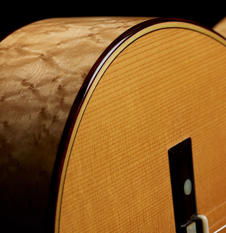 The top binding and purflings of a 2025 Francesco De Gregorio "Torres, SE 111" classical guitar made of spruce and maple