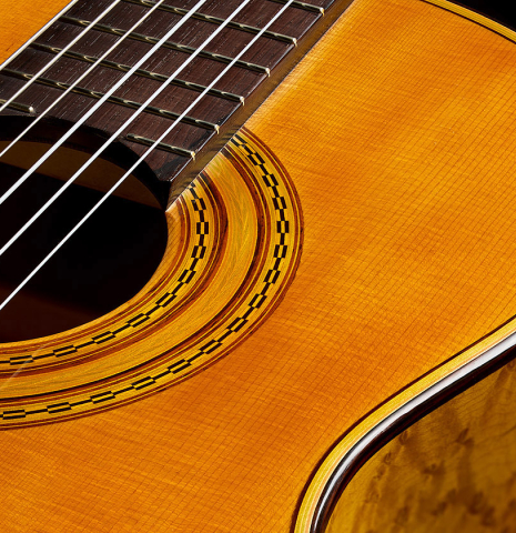 The soundboard and rosette detail of a 2025 Francesco De Gregorio "Torres, SE 111" classical guitar made of spruce and maple