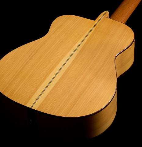 The back and sides of a 2012 Robert Desmond "cutaway w/electronics" classical guitar made of spruce and cypress