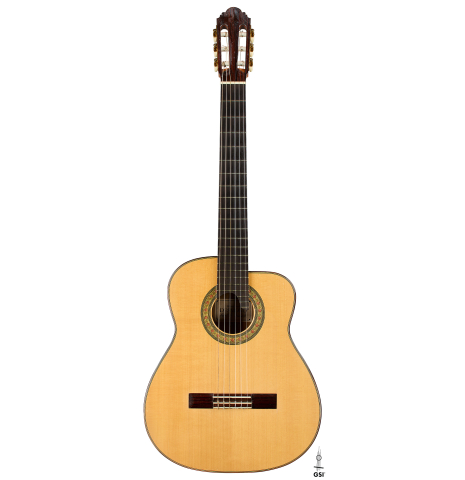 The front of a 2012 Robert Desmond "cutaway w/electronics" classical guitar made of spruce and cypress