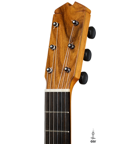 The headstock of a 2015 Ethan Deutsch w/pegs flamenco negra guitar made of spruce and CSA rosewood