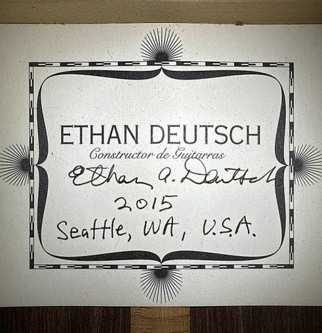 The label of a 2015 Ethan Deutsch w/pegs flamenco negra guitar made of spruce and CSA rosewood