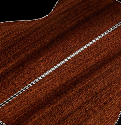 The back joint and inlays of a 2024 Marc Dickinson “Cosmic” classical guitar made of cedar and Indian rosewood