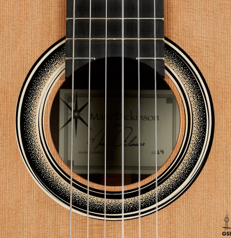 The rosette of a 2024 Marc Dickinson “Cosmic” classical guitar made of cedar and Indian rosewood