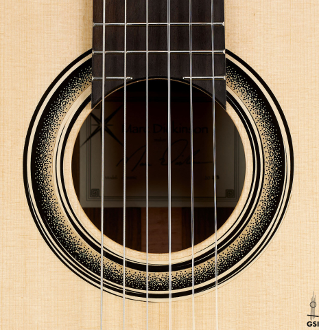 The rosette of a 2023 Marc Dickinson "Cosmic" classical guitar made of spruce and Indian rosewood