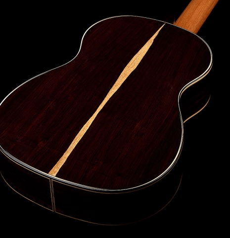 The back and sides of a 2026 Marc Dickinson "Cosmic" classical guitar made of spruce and African blackwood