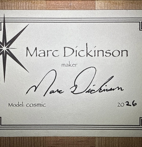 The label of a 2026 Marc Dickinson "Cosmic" classical guitar made of spruce and African blackwood