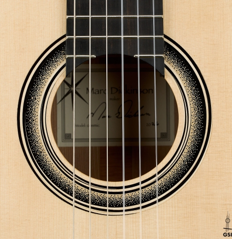 The rosette of a 2026 Marc Dickinson "Cosmic" classical guitar made of spruce and African blackwood
