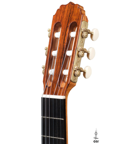 The headstock of a 2020 Vladimir Druzhinin classical guitar made of cedar and African rosewood