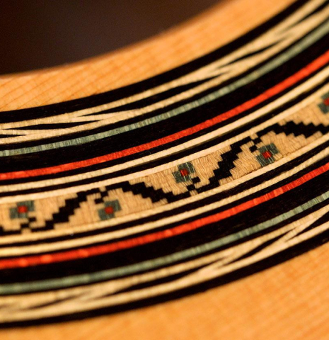 Close-up detail of the rosette of a 2020 Vladimir Druzhinin classical guitar made of cedar and African rosewood