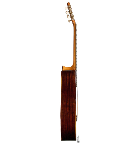 The side of a 2020 Vladimir Druzhinin classical guitar made of cedar and African rosewood. The side of a 2020 Vladimir Druzhinin classical guitar made of cedar and African rosewood.
