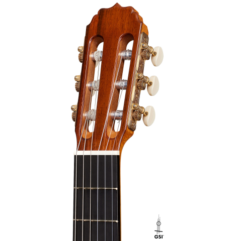 The headstock of a 2024 Vladimir Druzhinin classical guitar made with cedar and African rosewood.