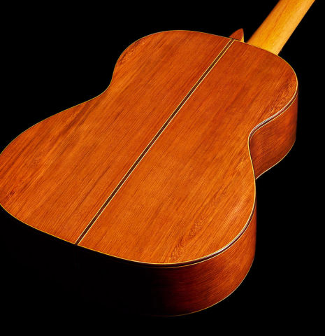 The back and sides of a 2024 Vladimir Druzhinin classical guitar made with cedar and African rosewood.