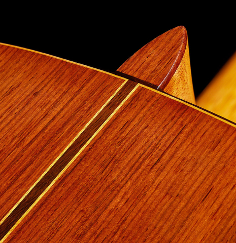 The heel, back binding and purflings of a 2024 Vladimir Druzhinin classical guitar made with cedar and African rosewood.