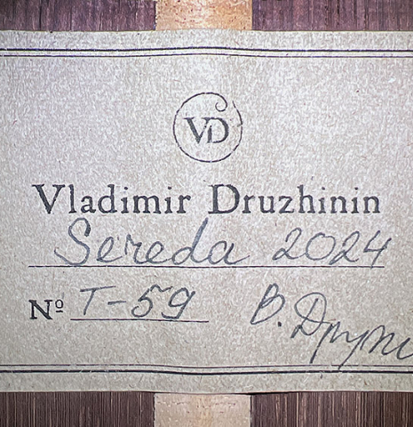 The label of a 2024 Vladimir Druzhinin classical guitar made with cedar and African rosewood.