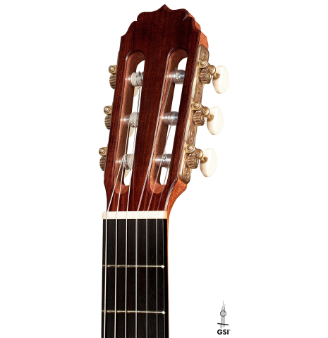 The headstock of a 2023 Vladimir Druzhinin classical guitar made with spruce and African rosewood.
