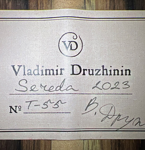 The label of a 2023 Vladimir Druzhinin classical guitar made with spruce and African rosewood.