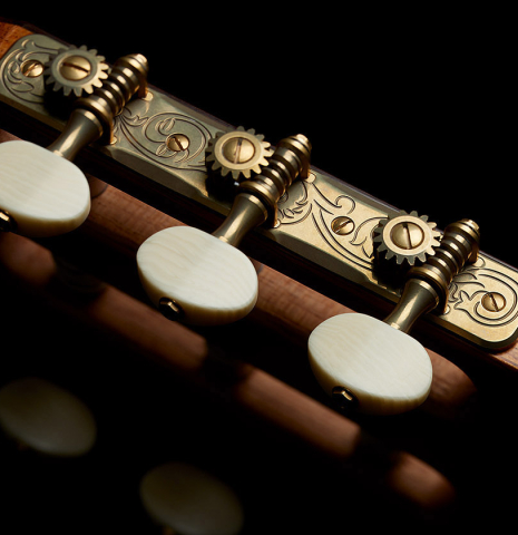 The tuning machines of a 2025 Vladimir Druzhinin classical guitar made of spruce and African rosewood