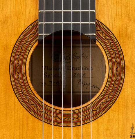 The rosette of a 2026 Vladimir Druzhinin "Special" classical guitar made of spruce and African rosewood