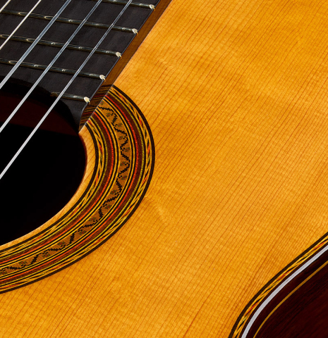The soundboard and rosette of a 2026 Vladimir Druzhinin "Special" classical guitar made of spruce and African rosewood