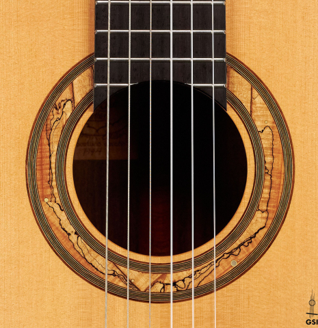 The rosette of a 1994 Jeffrey Elliott classical guitar made with spruce and Indian rosewood.