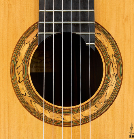 The rosette of a 1990 Jeffrey Elliott classical guitar made of spruce and African blackwood