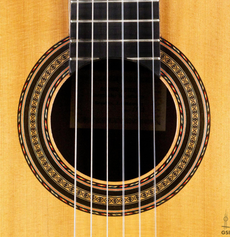 The rosette of a 1932 Domingo Esteso classical guitar made of spruce and CSA rosewood