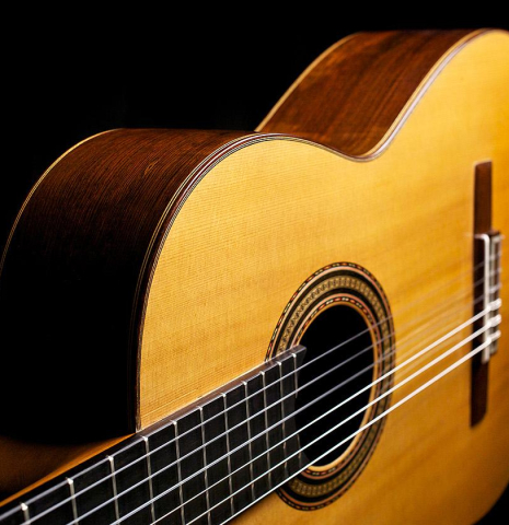 The top and side of a 1932 Domingo Esteso classical guitar made of spruce and CSA rosewood