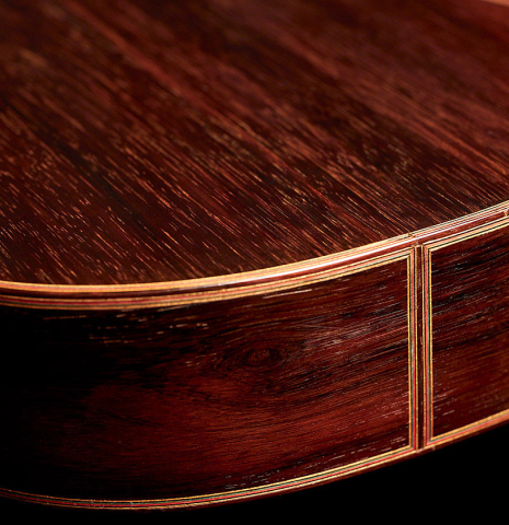 The back and sides of a 1933 Domingo Esteso classical guitar made with spruce and CSA rosewood