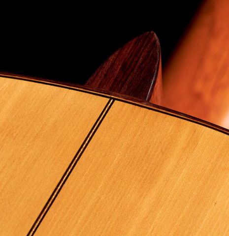 Close-up of back and heel of a 1929 Domingo Esteso classical guitar made with spruce and cypress