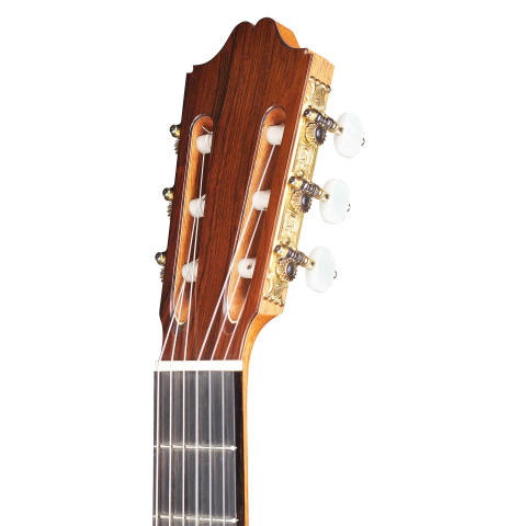 The headstock of a 2007 Antonio Raya Ferrer classical guitar made of cedar and Indian rosewood