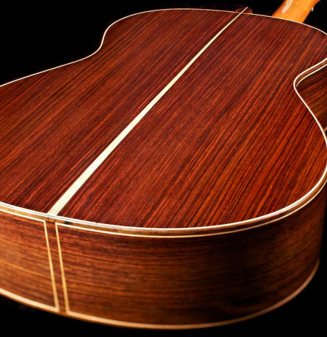 The back and sides of a 2007 Antonio Raya Ferrer classical guitar made of cedar and Indian rosewood