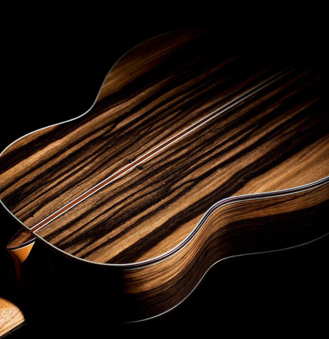 This is the back of a 2020 Gerundino Fernandez Hijo &quot;Negra&quot; flamenco guitar made with exotic ebony and cedar.
