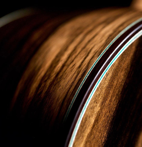 This is the side of a 2020 Gerundino Fernandez Hijo &quot;Negra&quot; flamenco guitar made with exotic ebony and cedar.