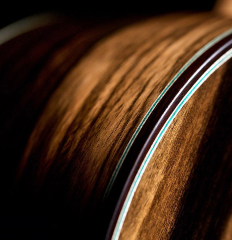 This is the side of a 2020 Gerundino Fernandez Hijo "Negra" flamenco guitar made with exotic ebony and cedar.